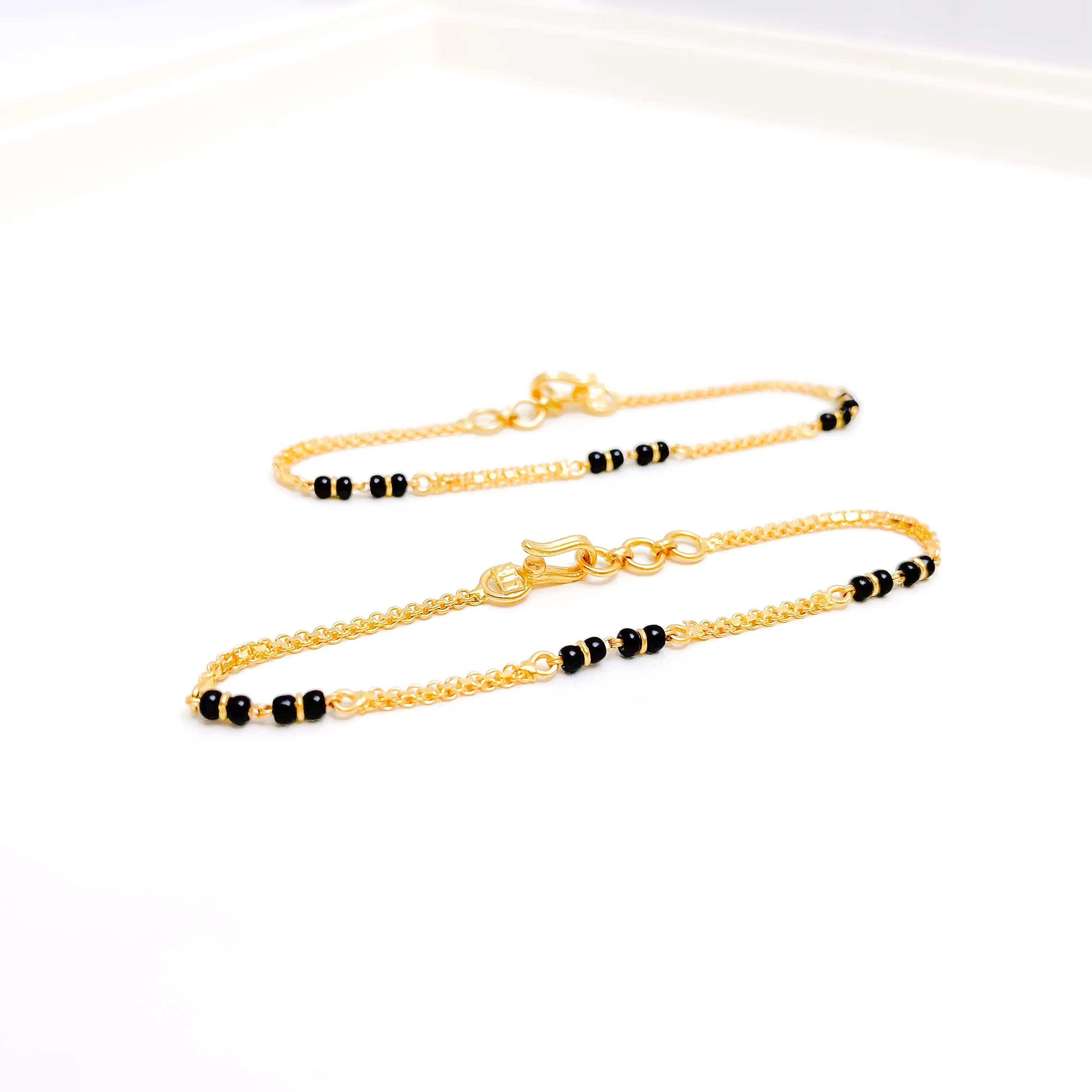 Black Bead Accented Baby Bracelet Pair