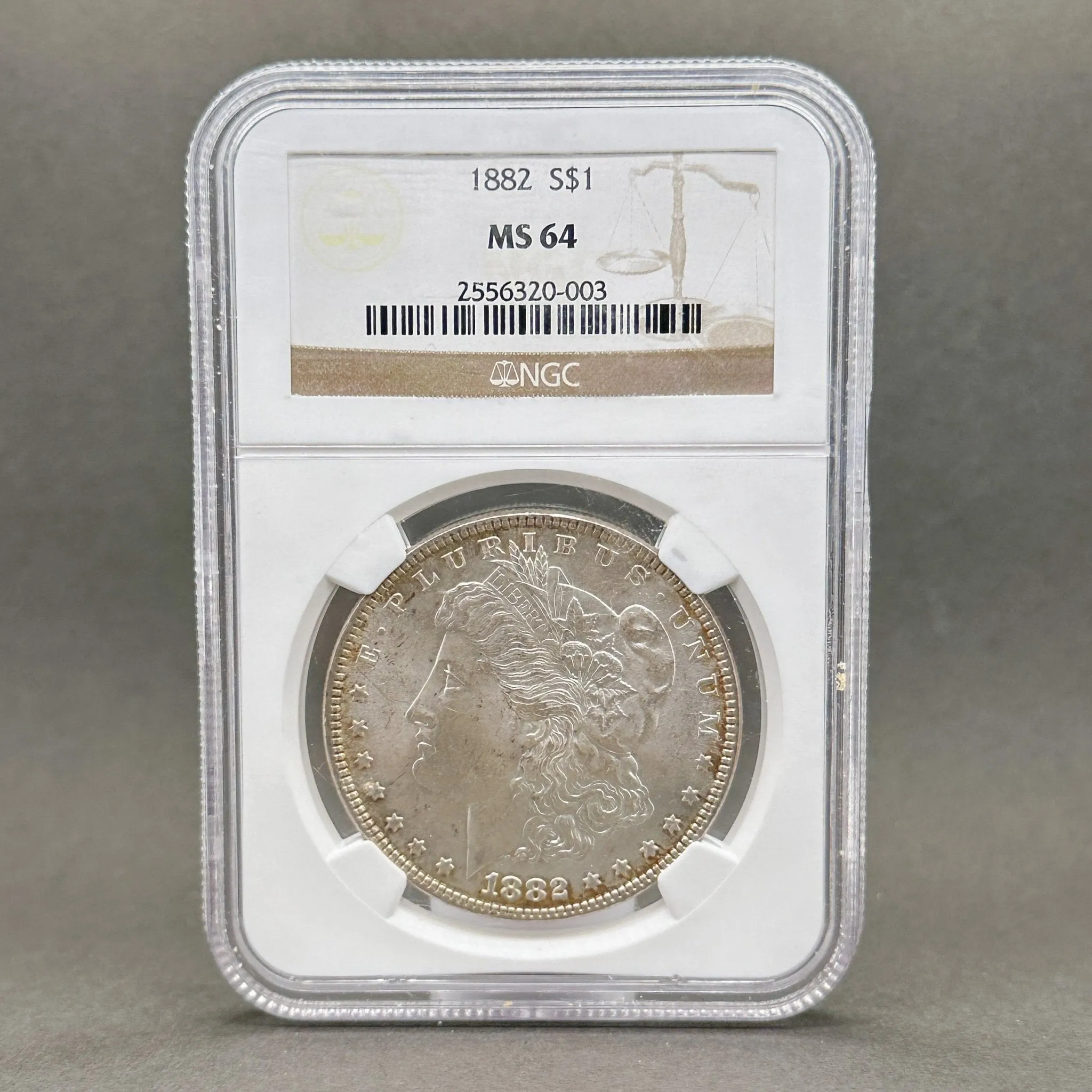 Estate 0.900 Fine Silver 1882 S$1 Morgan Dollar NGC MS 64